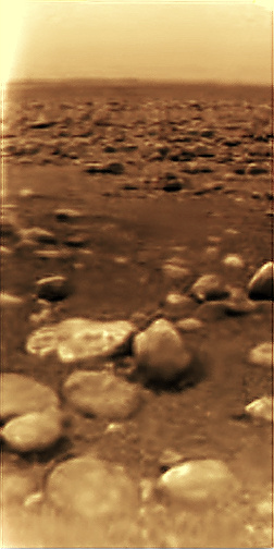 This image of Titan’s surface, taken by the Huygens probe, is the only image from the surface of a body further away than Mars. (Image: NASA/Huygens)